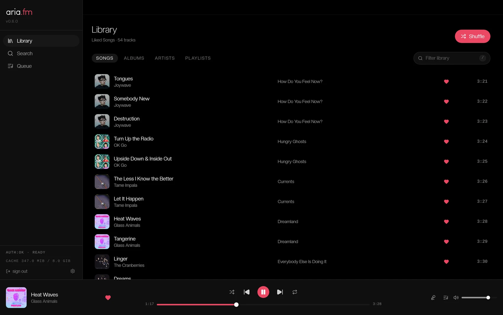 aria.fm's Library — a list of saved songs with the now-playing bar